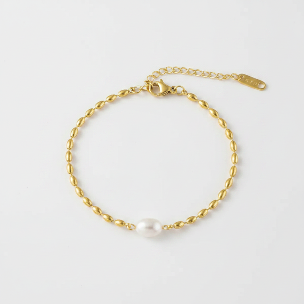 Bracciale gold perla - sfondo grigio chiarissimo piatto