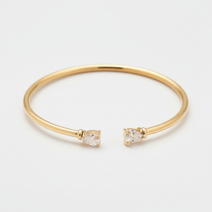 Bracciale rigido dorato con cristalli