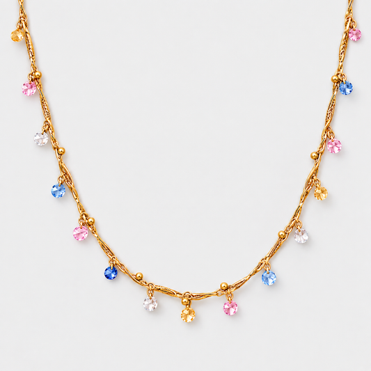 Collana Shiny Pastel gold con piccoli pendenti sfaccettati rosa azzurri bianchi e gialli