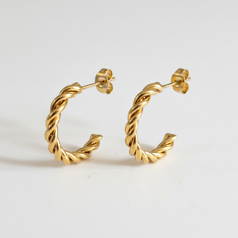 Coppia orecchini intrecciati gold ancora più luminosi
