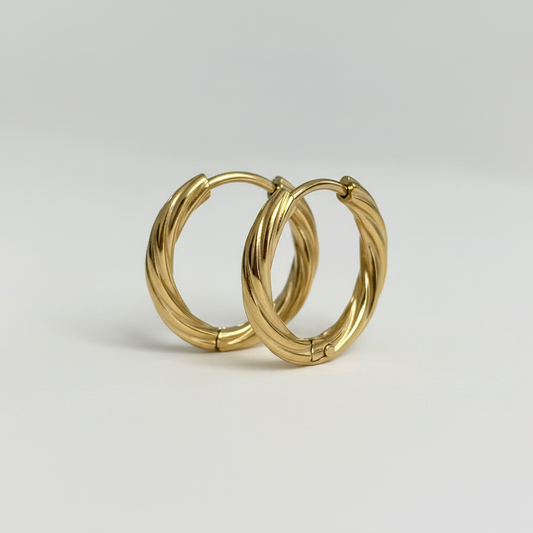 Orecchini cerchietti twist luminosi